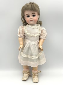 J.D. KESTNER POUTY FACE BISQUE-HEAD DOLL Germany, Circa 1910 Height 12".
