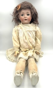 SIMON & HALBIG BISQUE DOLL WITH RARE CLOCKWORK EYE MECHANISM Germany, Circa 1910 Height 30".