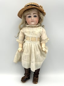 J.D. KESTNER POUTY FACE BISQUE-HEAD DOLL Germany, Circa 1890 Height 11".