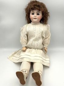 SIMON & HALBIG 719 BISQUE-HEAD DOLL Germany, Circa 1910 Height 23".