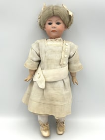 GEBRUDER HEUBACH 6969 POUTY FACE BISQUE-HEAD DOLL Germany, Circa 1910 Height 11".