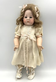 ARMAND MARSEILLE "FANY" BISQUE-HEAD DOLL France, Circa 1910 Height 14".