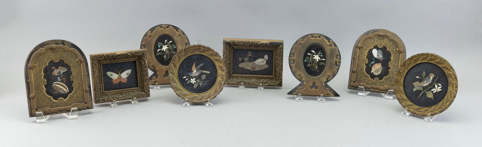 EIGHT PIETRA DURA PANELS Probably Italy, Late 19th/Early 20th Century Framed to 6.75" x 5.5".: EIGHT PIETRA DURA PANELS Probably Italy, Late 19th/Early 20th Century Depict floral sprigs, songbirds on branches, butterflies, etc. Two in matching tombstone-shaped engraved frames, two in matching k