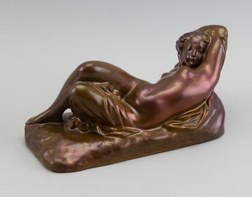 ZSOLNAY PECS PORCELAIN FIGURE OF A RECLINING NUDE WOMAN Hungary, Late 19th Century Height 4.25".