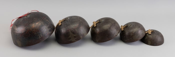 GRADUATED SET OF FIVE JAPANESE BRONZE TEMPLE BELLS Late Meiji Period Bell diameters from 3.5" to 7".