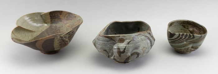 MAKOTO YABE (Japan/Massachusetts, 1947-2005), Three lobed bowls with folded rims and earth-tone