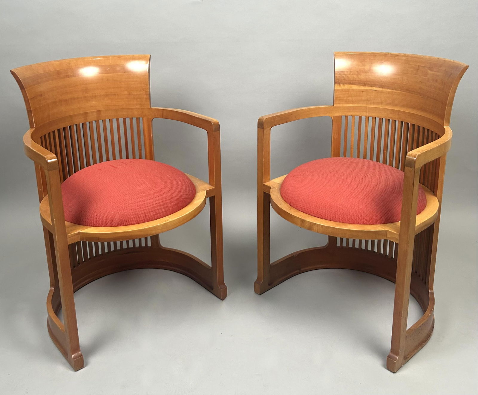PAIR OF FRANK LLOYD WRIGHT (1867-1959) FOR CASSINA BARREL CHAIRS Italy, 1980s reissue Back heights (1 of 2)