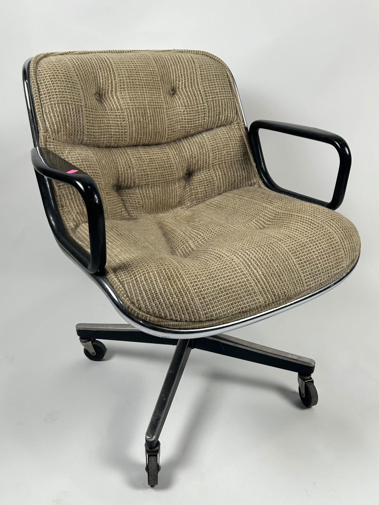 CHARLES POLLOCK (1930-2013) FOR KNOLL EXECUTIVE ARMCHAIR 20th Century Back height 33". Seat height: CHARLES POLLOCK (1930-2013) FOR KNOLL EXECUTIVE ARMCHAIR20th CenturyThermoformed plastic shell with black chrome-plated aluminum arms and tweed upholstery. Rolling swivel base. Retains original label.