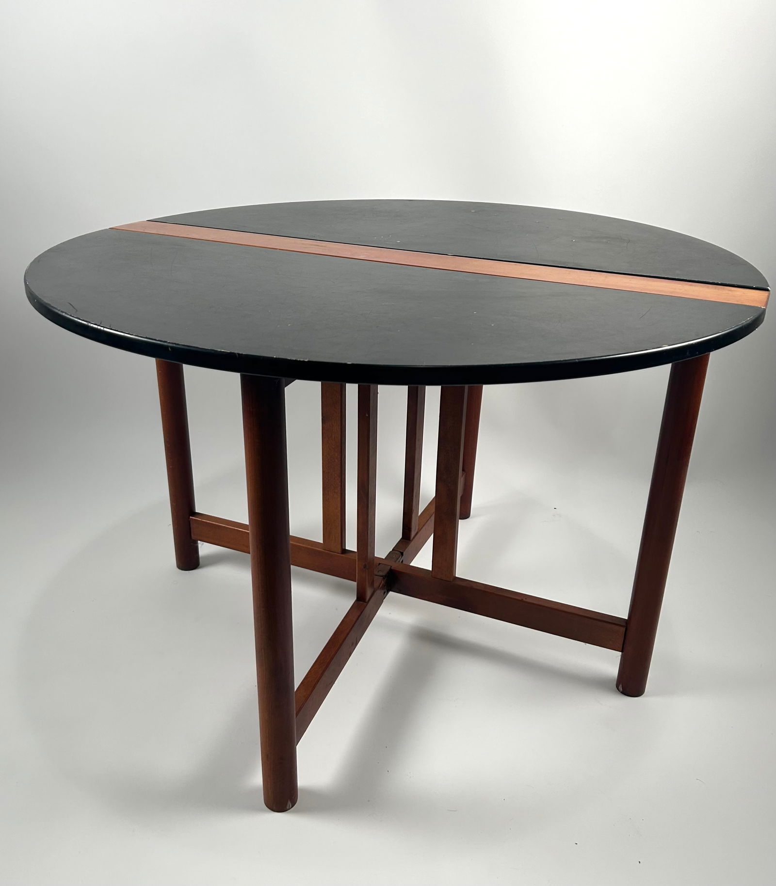HYLLINGE MOBLE MID-CENTURY FOLDING TABLE Denmark, Circa 1970 Height 29". Length 4" plus two 20" drop (1 of 3)