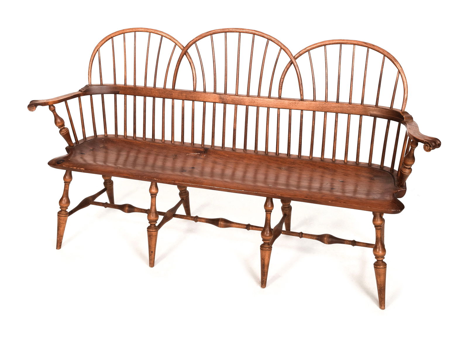 D.R. DIMES TRIPLE BOW-BACK WINDSOR BENCH New Hampshire, 20th Century Back height 40". Seat height: D.R. DIMES TRIPLE BOW-BACK WINDSOR BENCHNew Hampshire, 20th CenturyIn maple with oak bow-back supports and a pine seat. Out-scrolled arms terminate in scrolled knuckles. Turned legs and stretcher. Bra