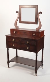 TWO-PART DRESSING TABLE INFLUENCED BY DUNCAN PHYFE New York, Circa 1825 Height 64.5". Width 34.5".