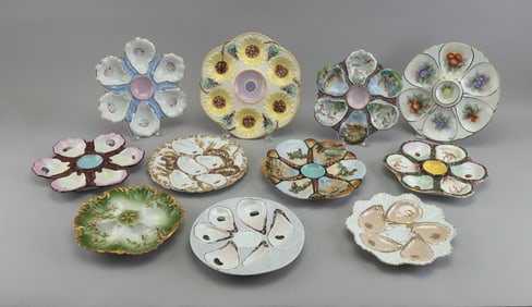 COLLECTION OF ELEVEN PORCELAIN OYSTER PLATES 19th/20th Century Diameters from 8" to 9.5".