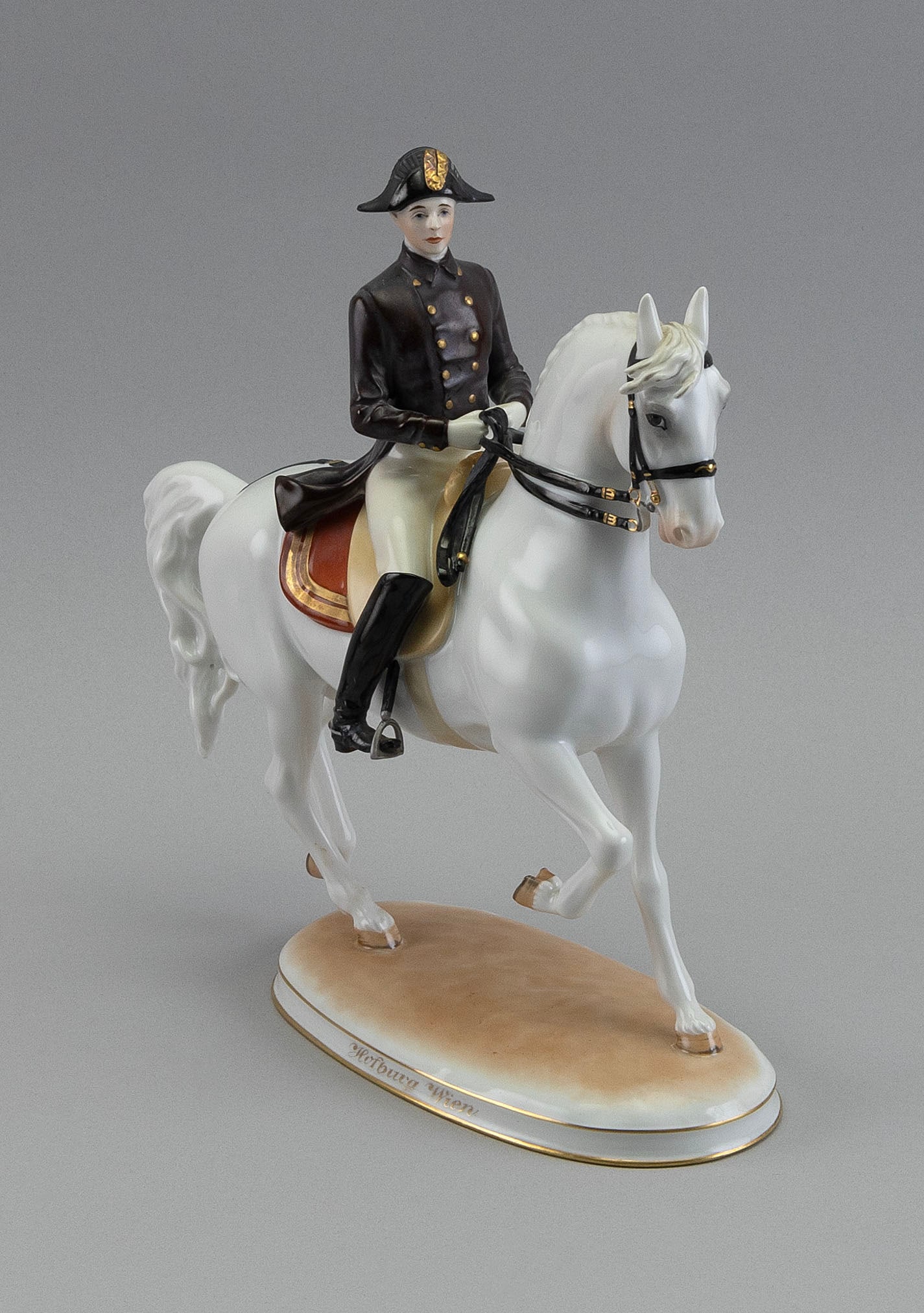 AUGARTEN VIENNA PORCELAIN FIGURE OF A DRESSAGE HORSE AND RIDER 20th Century Height 10". Length 10". (1 of 3)