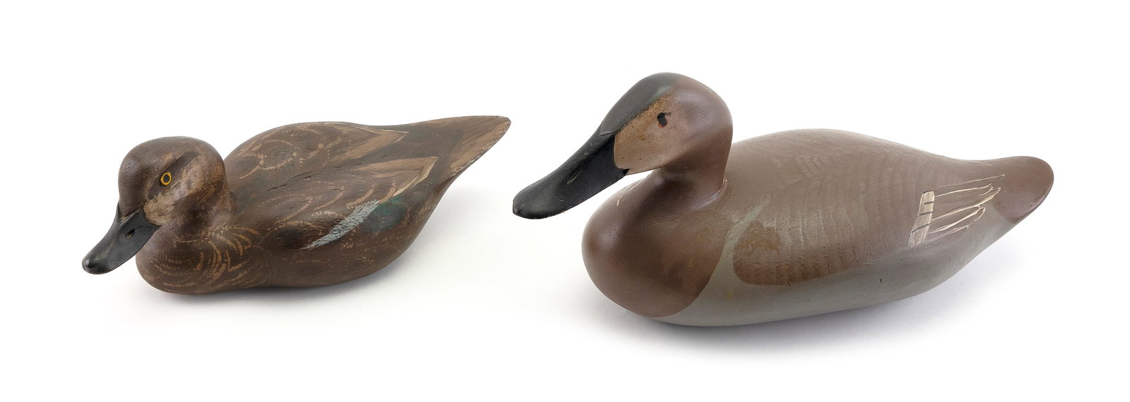 TWO DECOYS 20th Century Lengths 12.5" and 16".: TWO DECOYS 20th Century A Jerry Durpe Louisiana blue-winged teal hen and a Chesapeake Bay area canvasback hen. Lengths 12.5" and 16".