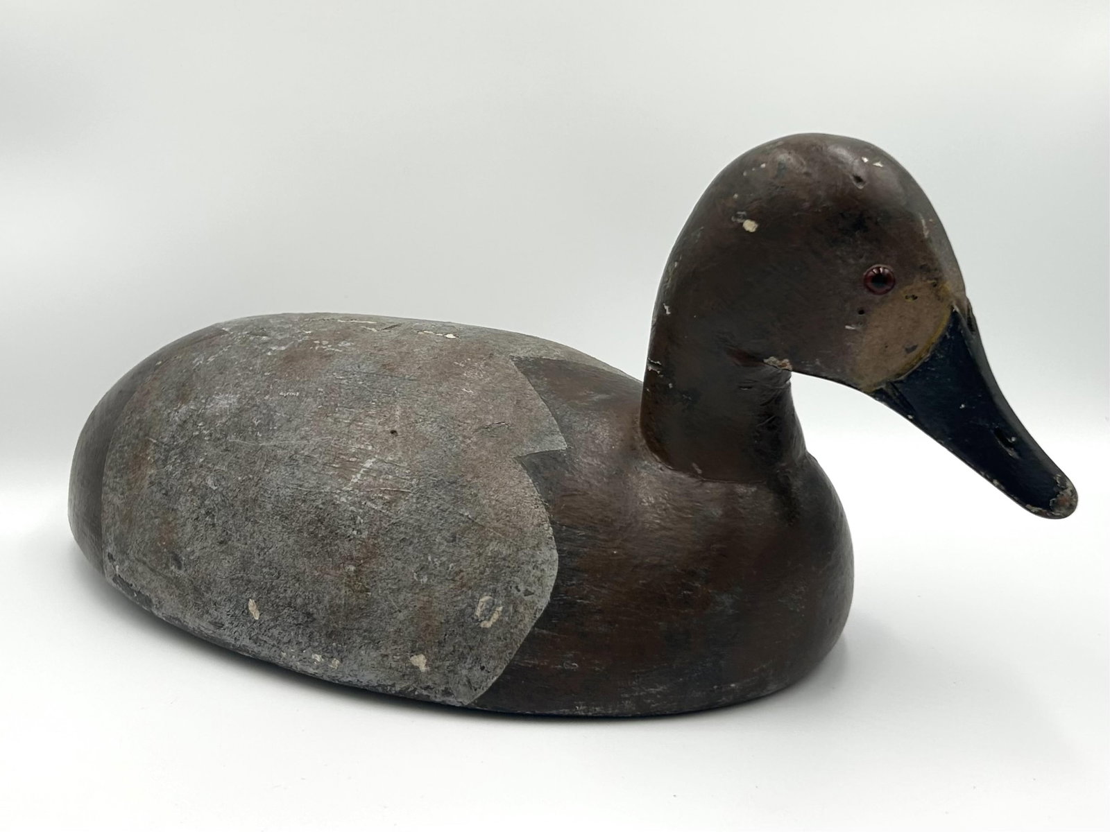 MICHIGAN CANVASBACK HEN DECOY 20th Century Length 16".: MICHIGAN CANVASBACK HEN DECOY 20th Century Maker unknown. Glass eyes. Length 16".