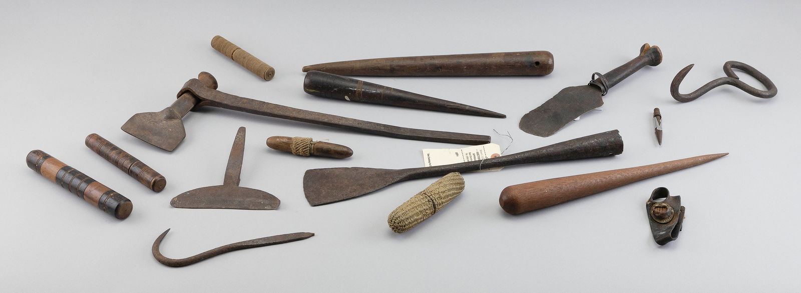 COLLECTION OF ASSORTED SAILMAKER'S AND WHALEMAN'S IMPLEMENTS 19th Century Lengths from 6" to 20".: COLLECTION OF ASSORTED SAILMAKER'S AND WHALEMAN'S IMPLEMENTS19th CenturyTotal of 15 items including fids, needle cases, spades, etc.Lengths from 6" to 20".