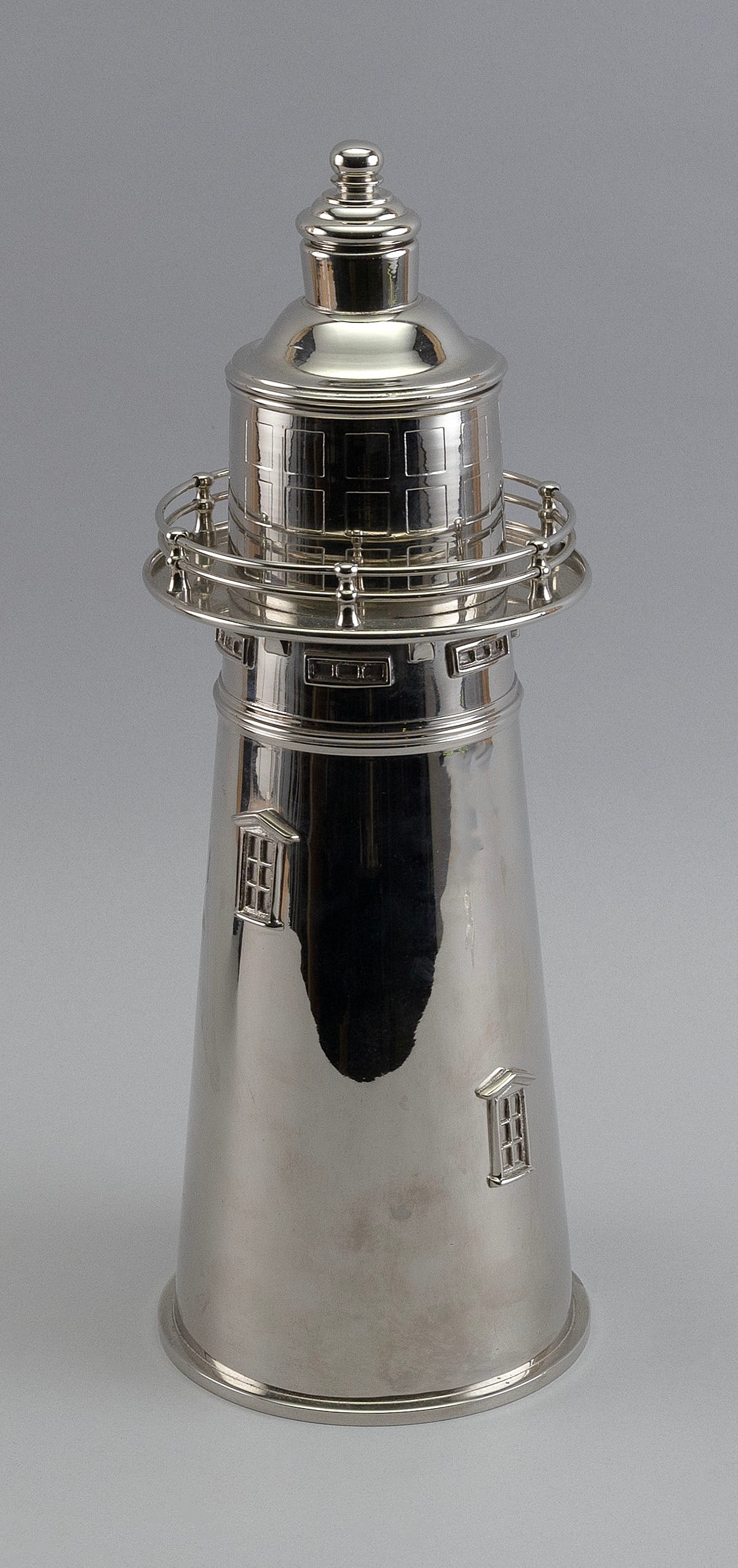 LIGHTHOUSE-FORM COCKTAIL SHAKER Contemporary Height 14.5".: LIGHTHOUSE-FORM COCKTAIL SHAKER Contemporary Silver tone metal. Height 14.5".