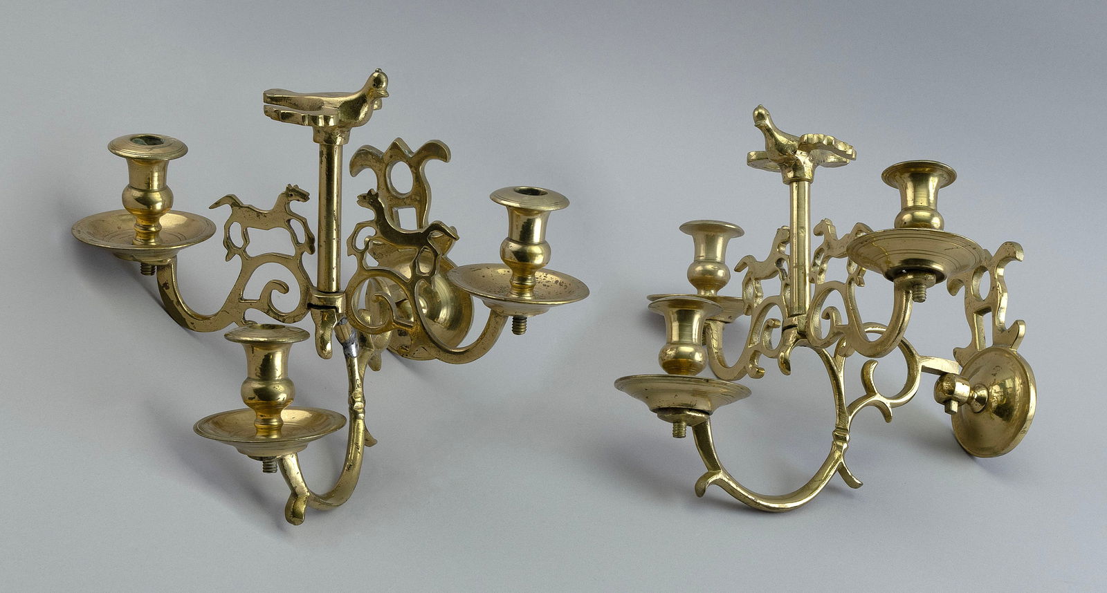 PAIR OF CONTINENTAL BRASS WALL SCONCES Late 18th/Early 19th Century Heights 9". Widths 11.25". (1 of 2)