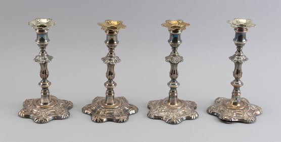 SET OF FOUR ENGLISH SILVER PLATED CANDLESTICKS 18th/Early 19th Century Heights 9". Base diameters