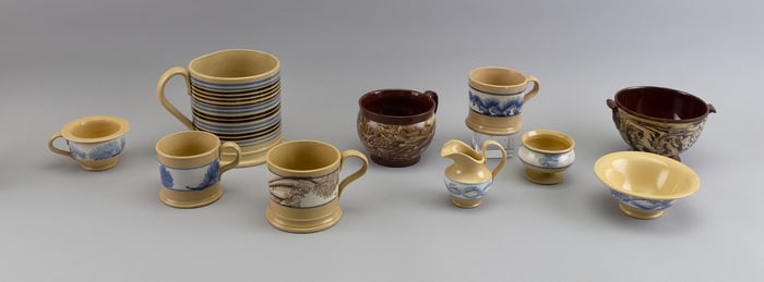 NINE PIECES OF YELLOW WARE AND MARBLEIZED POTTERY 19th Century