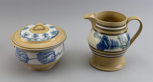 TWO PIECES OF YELLOW WARE 19th Century Pitcher height 8.5". Base diameter 6.375". Chamber pot height