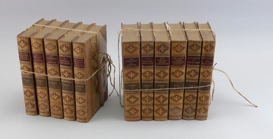 SET OF ELEVEN LEATHER-BOUND BOOKS Late 19th/Early 20th Century Each 5.5" x 8".