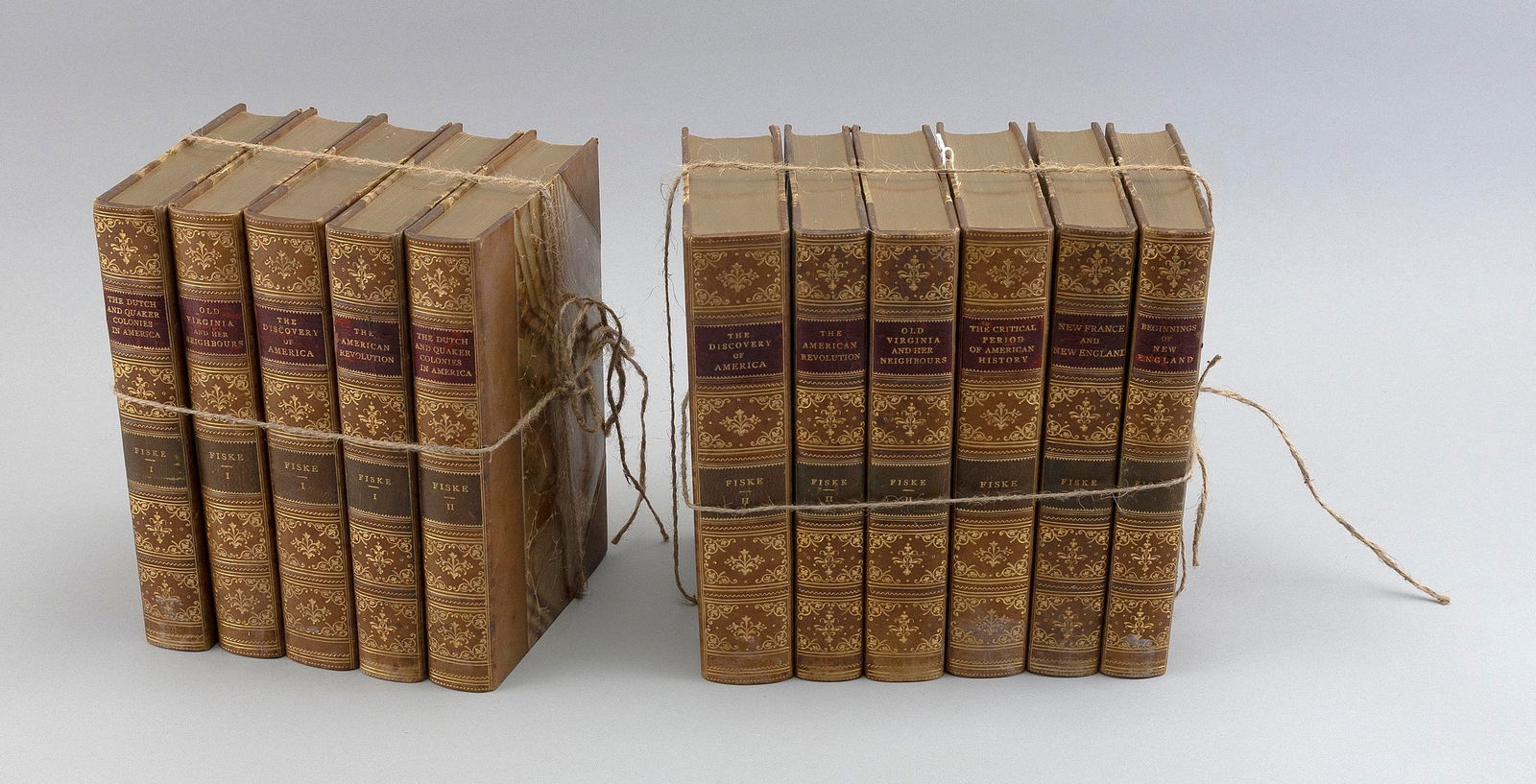 SET OF ELEVEN LEATHER-BOUND BOOKS Late 19th/Early 20th Century Each 5.5" x 8". (1 of 2)