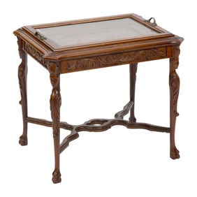 RELIEF-CARVED COFFEE TABLE Early 20th Century Height 22". Top 18" x 24".