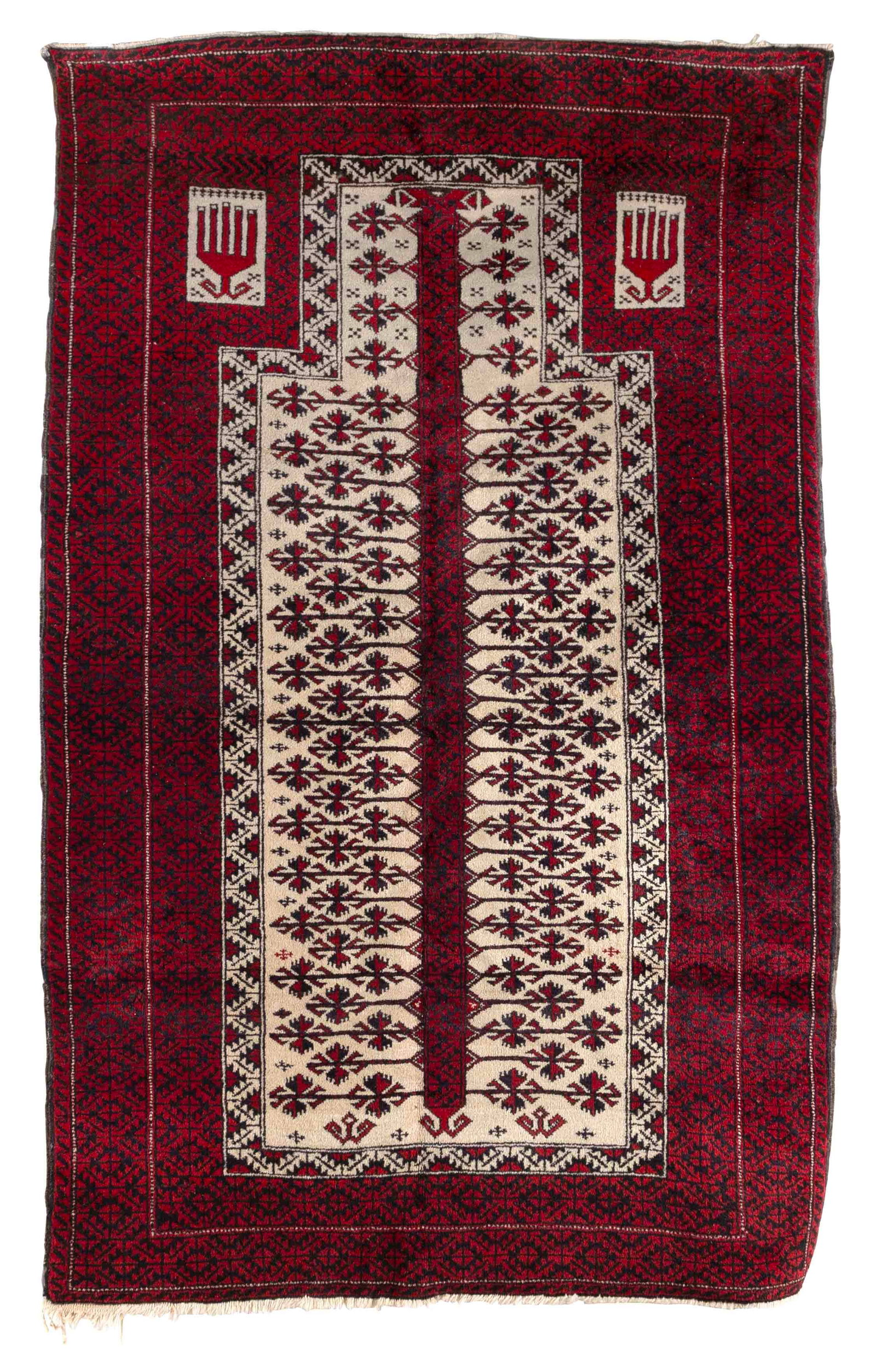 BELOUCH PRAYER RUG: 3'5" X 5'5" Last Quarter of the 20th Century: BELOUCH PRAYER RUG: 3'5" X 5'5" Last Quarter of the 20th Century Ivory field and rectangular mihrab contain a stout trunk bearing delicate dark red and charcoal branches. Red borders occupied by an in