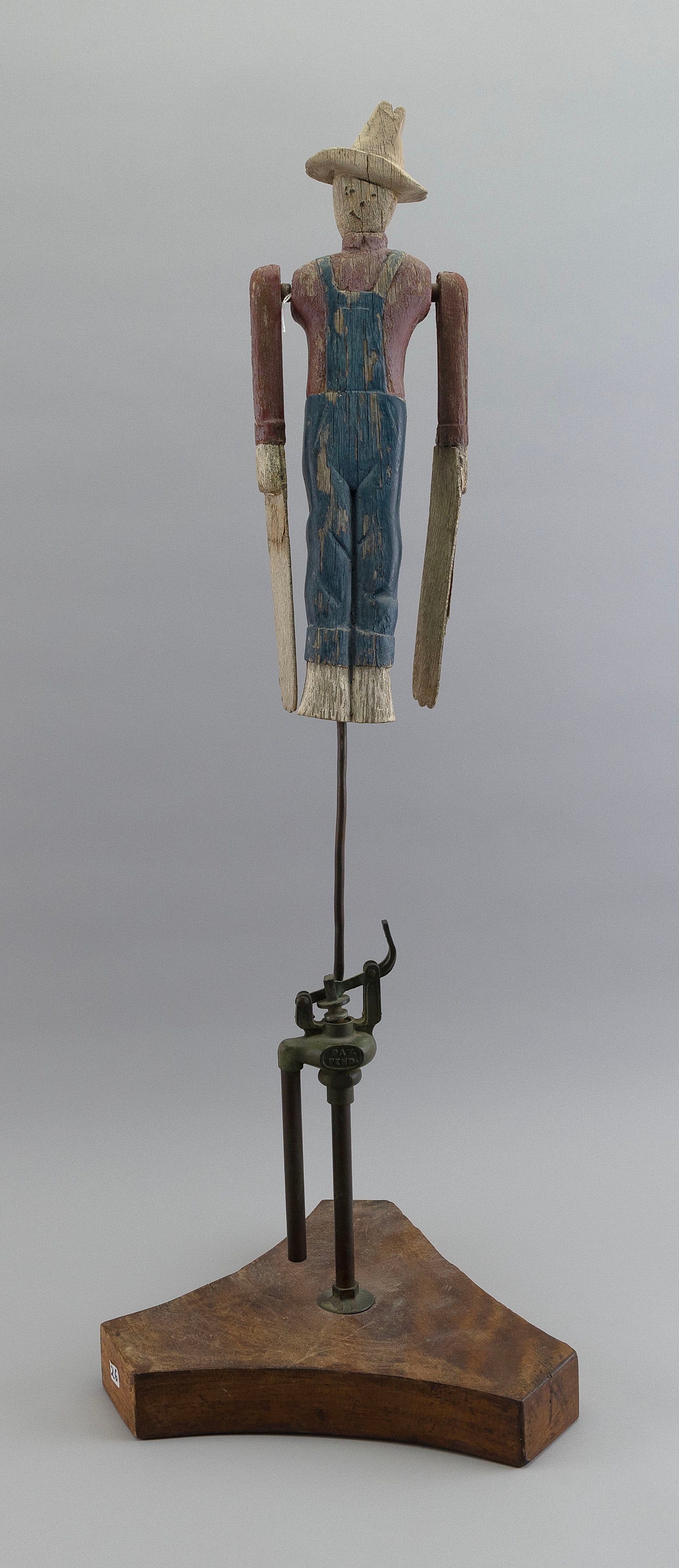 CARVED AND PAINTED WOODEN FARMER WHIRLIGIG 20th Century Height 20.5". Width 5.25". (1 of 2)