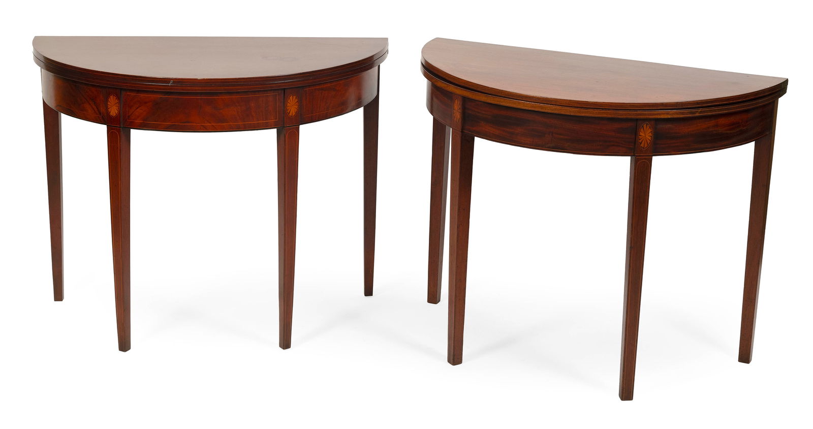 NEAR-PAIR OF HEPPLEWHITE CARD TABLES Circa 1800 Heights 29.75". Widths 36". Depths 17.75".: NEAR-PAIR OF HEPPLEWHITE CARD TABLESCirca 1800In the manner of William Fisk of Salem, Massachusetts. Mahogany with patera and string inlay.Heights 29.75". Widths 36". Depths 17.75".