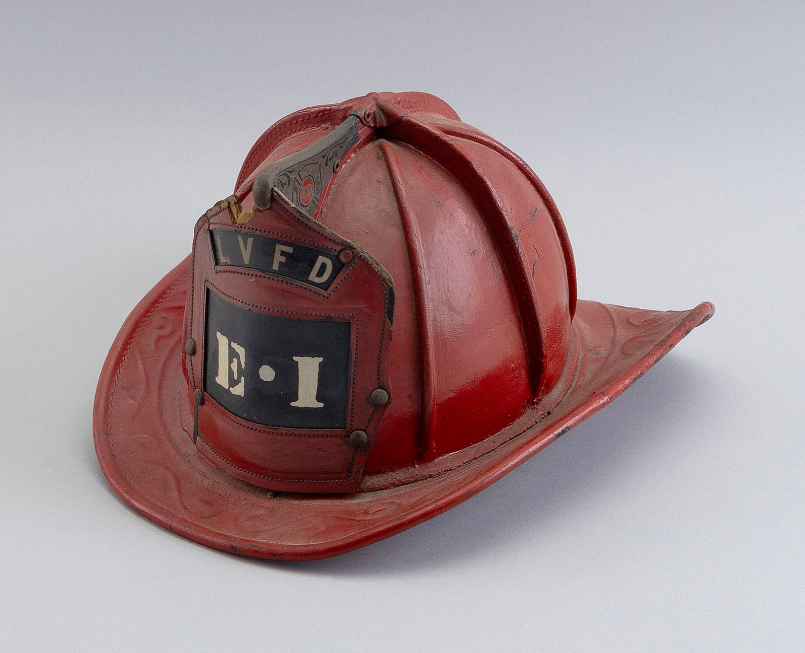 CAIRNS & BROTHER LEATHER FIRE HELMET Early 20th Century Height 7.5". Width 11". Depth 14". (1 of 4)