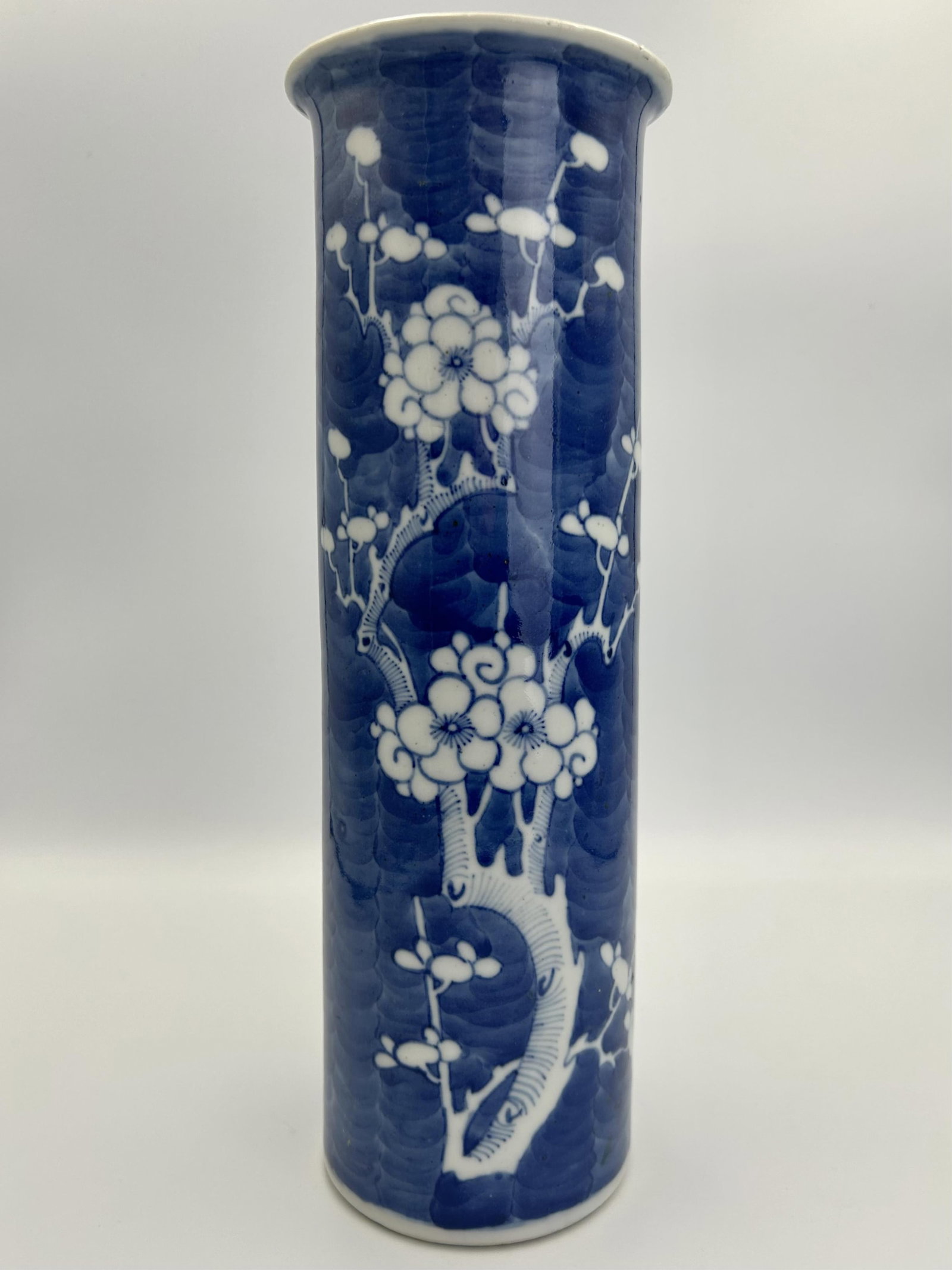CHINESE BLUE AND WHITE PORCELAIN CYLINDER VASE Mid-19th Century Height 12".: CHINESE BLUE AND WHITE PORCELAIN CYLINDER VASE Mid-19th Century In Hawthorn pattern. Four-character Kangxi mark on base. Height 12".