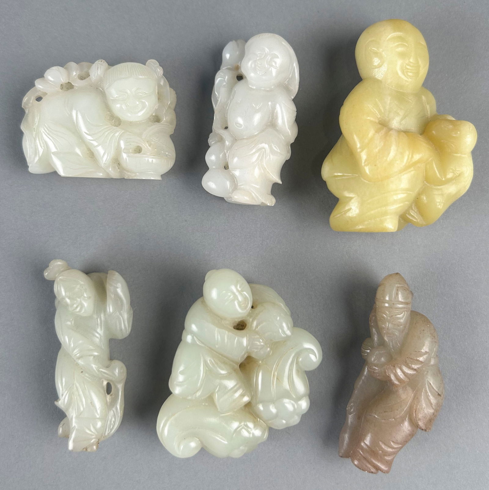 SIX ASSORTED CHINESE CARVED JADE FIGURES Heights from 2" to 2.5". (1 of 8)