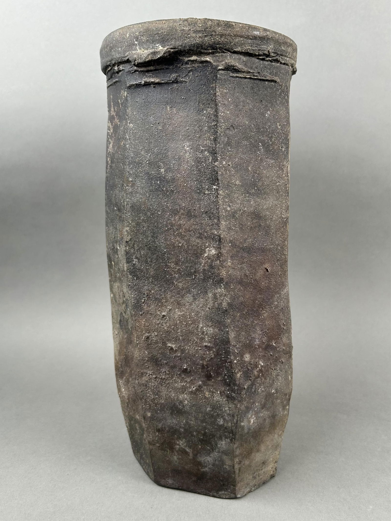 SHIRO TSUJIMURA (Japan, 1947-), Cylindrical paneled vase., Stoneware, height 12". (1 of 8)