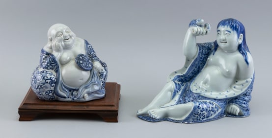 TWO CHINESE BLUE AND WHITE PORCELAIN FIGURES Early 20th Century Heights 7" and 8".