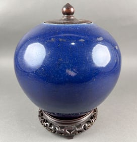 CHINESE COBALT BLUE PORCELAIN OVOID COVERED JAR 19th Century Height 8". Open-carved wood stand.