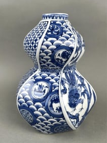JAPANESE BLUE AND WHITE ARITA PORCELAIN HEXAGONAL DOUBLE GOURD VASE Meiji Period Height 8".