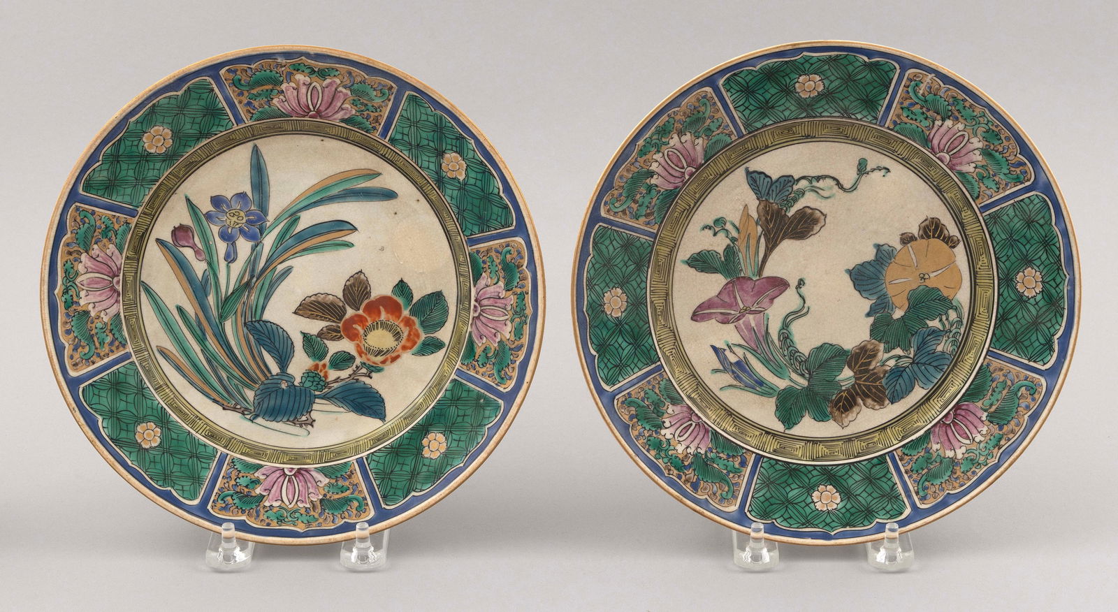 PAIR OF JAPANESE KUTANI PORCELAIN PLATES Meiji Period Diameters 8.5".: PAIR OF JAPANESE KUTANI PORCELAIN PLATESMeiji PeriodCentral decoration of flowers and vines surrounded by paneled borders. Signed on bases.Diameters 8.5". Provenance:The Estate of Edward J. Tynan.