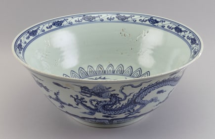 CHINESE BLUE AND WHITE PORCELAIN DRAGON BOWL Late 19th/Early 20th Century Height 8". Diameter 16.5".