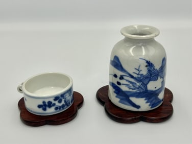 TWO CHINESE BLUE AND WHITE PORCELAIN BIRD FEEDERS FROM A BIRDCAGE Early 20th Century Heights 1" and