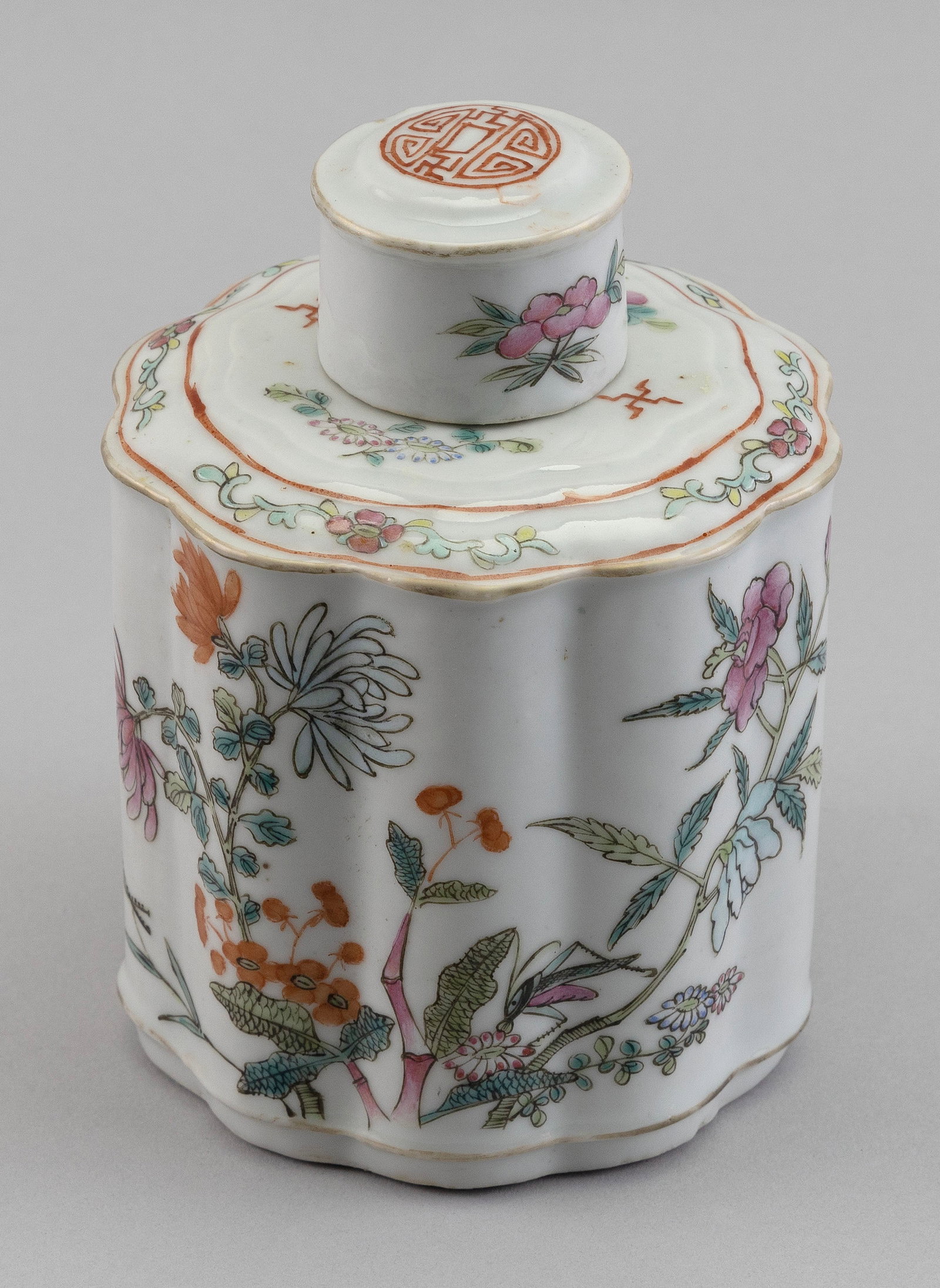 CHINESE FAMILLE ROSE PORCELAIN TEA CADDY Late 19th Century Height 6". Diameter 5".: CHINESE FAMILLE ROSE PORCELAIN TEA CADDY Late 19th Century Lobed cylinder form with conforming cover. Decoration of chrysanthemums and other floral sprays. Height 6". Diameter 5".