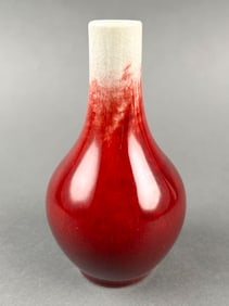 CHINESE SMALL SANG DE BOEUF PORCELAIN TEARDROP VASE Late 19th/Early 20th Century Height 5".