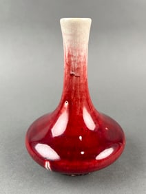 CHINESE SANG DE BOEUF PORCELAIN BLADDER VASE Late 19th/Early 20th Century Height 5.25".