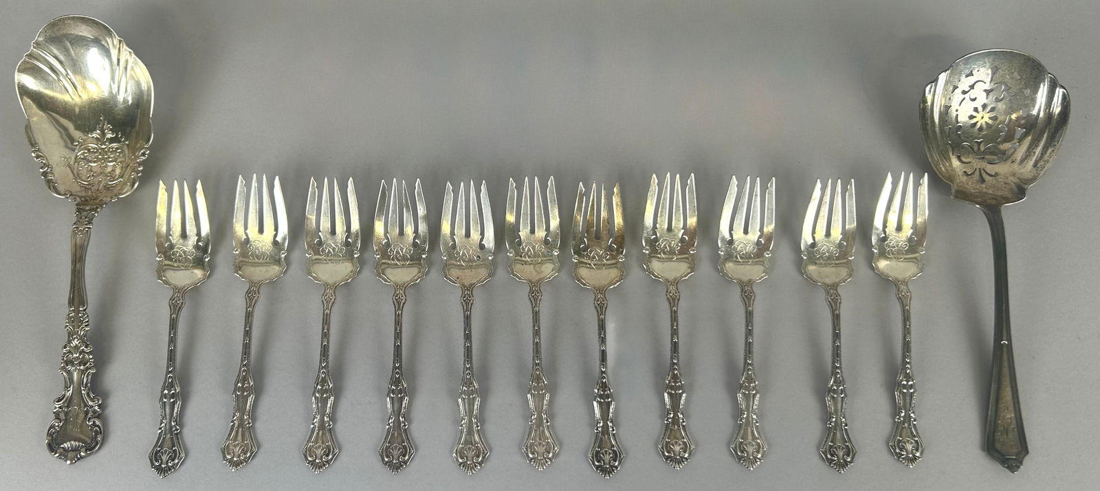THIRTEEN PIECES OF STERLING SILVER FLATWARE Early to Mid-20th Century Approx. 17.8 troy oz. (1 of 3)