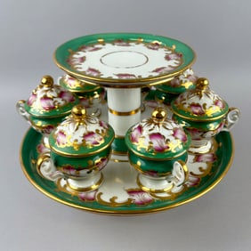 APPLE GREEN PORCELAIN POTS DE CR?ME SET France, Early to Mid-19th Century Stand height 8.25".