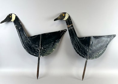 PAIR OF SHEET METAL CANADA GOOSE DECOYS Early 20th Century Heights 29".