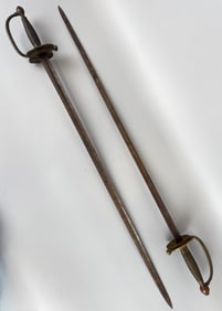 PAIR OF CIVIL WAR-ERA NON-COMMISSIONED OFFICER SWORDS Philadelphia, Mid-19th Century Lengths 39".