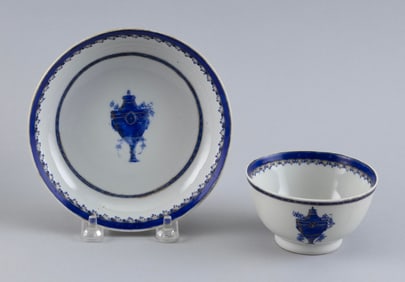 CHINESE EXPORT ARMORIAL PORCELAIN CUP AND SAUCER 19th Century Cup height 2". Diameter 3.25". Saucer