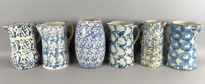 SIX SPONGE-DECORATED SALT GLAZE PITCHERS Late 19th Century Heights from 9" to 10".